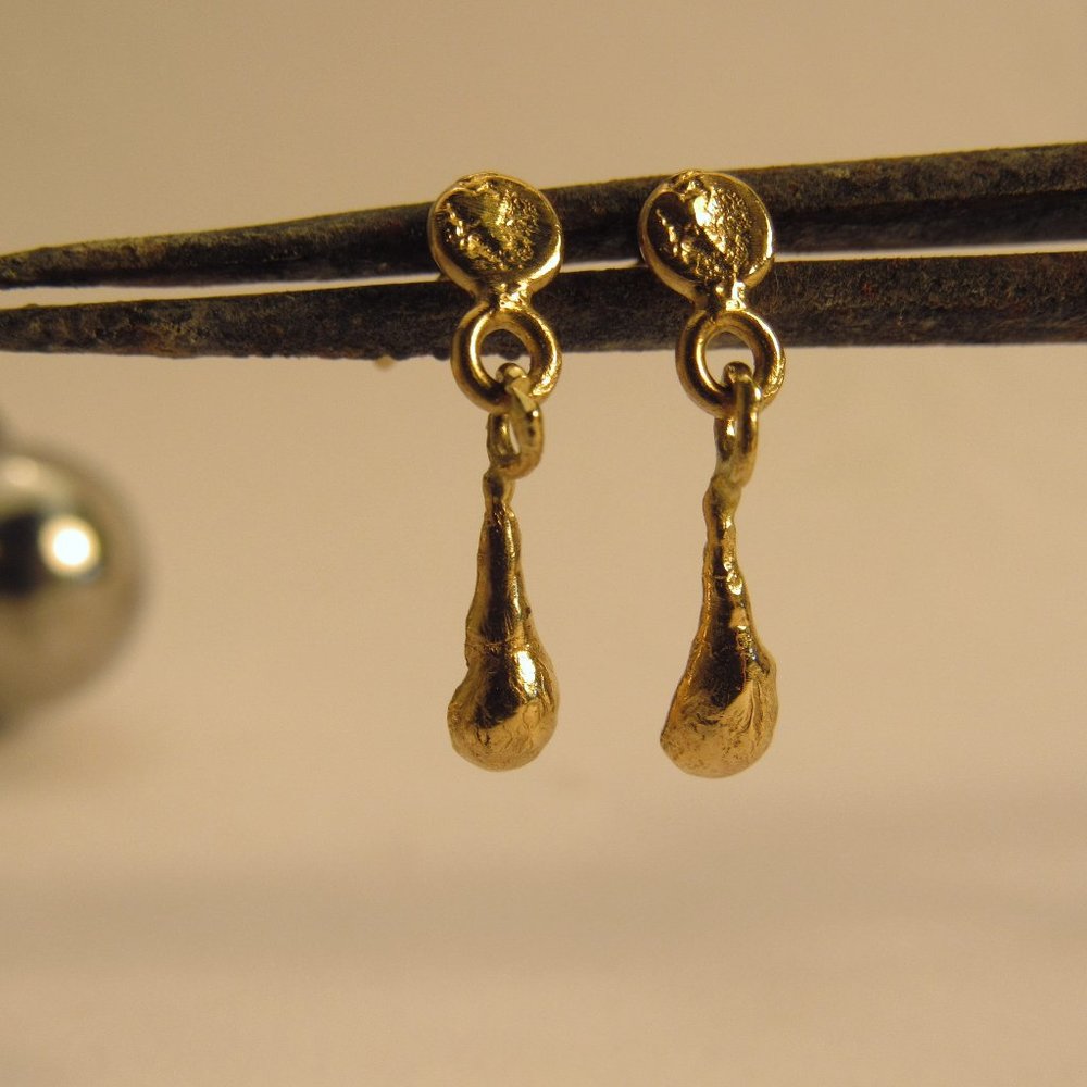 Gold earrings. 14 karat yellow gold earrings.
